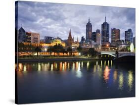 Australia, Victoria, Melbourne; Yarra River and City Skyline by Night-Andrew Watson-Stretched Canvas