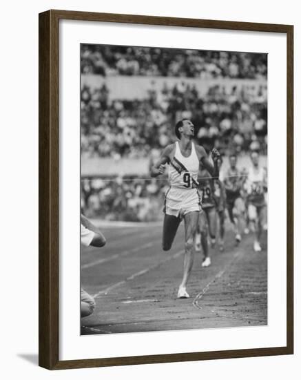 Australian Herb Elliot, Winning Men's 1500 Meter Race, at Olympics-George Silk-Framed Premium Photographic Print