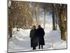 Austrian Tyrol Zillertal Valley Mayrhofen Ski Resort Hippach Village Old Women Walking in Snow-Christian Kober-Mounted Photographic Print