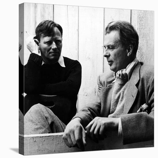 Author Christopher Isherwood Speaking with Fellow Author Aldous Huxley-null-Stretched Canvas