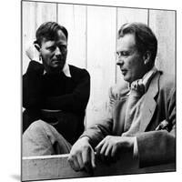 Author Christopher Isherwood Speaking with Fellow Author Aldous Huxley-null-Mounted Premium Photographic Print