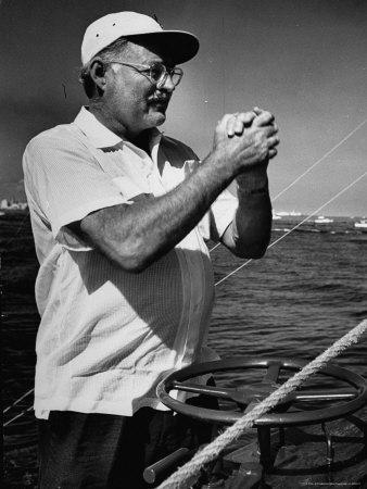 Author Ernest Hemingway at Wheel of Fishing Boat During Fishing Tournament'  Premium Photographic Print - Alfred Eisenstaedt | AllPosters.com