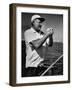 Author Ernest Hemingway at Wheel of Fishing Boat During Fishing Tournament-Alfred Eisenstaedt-Framed Premium Photographic Print