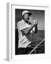 Author Ernest Hemingway at Wheel of Fishing Boat During Fishing Tournament-Alfred Eisenstaedt-Framed Premium Photographic Print
