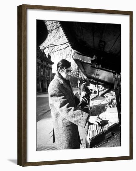 Author Julio Cortazar Looking Bookstalls on Street-null-Framed Premium Photographic Print