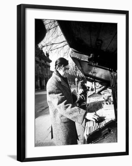 Author Julio Cortazar Looking Bookstalls on Street-null-Framed Premium Photographic Print