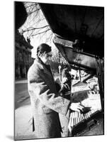 Author Julio Cortazar Looking Bookstalls on Street-null-Mounted Premium Photographic Print