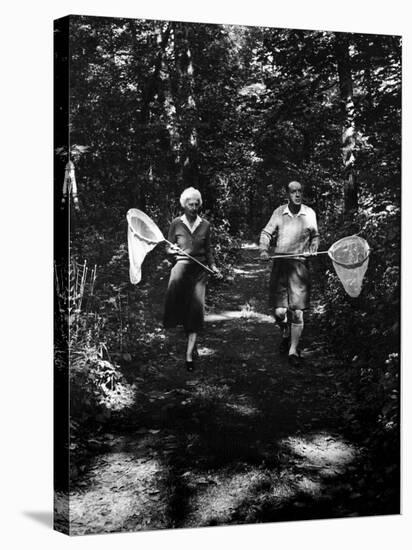 Author Vladimir Nabokov and His Wife Vera Chasing Butterflies-Carl Mydans-Stretched Canvas