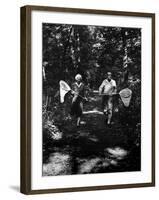 Author Vladimir Nabokov and His Wife Vera Chasing Butterflies-Carl Mydans-Framed Premium Photographic Print