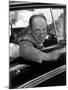 Author Vladimir Nabokov Looking Out Car Window. He Likes to Work in the Car, Writing on Index Cards-Carl Mydans-Mounted Premium Photographic Print