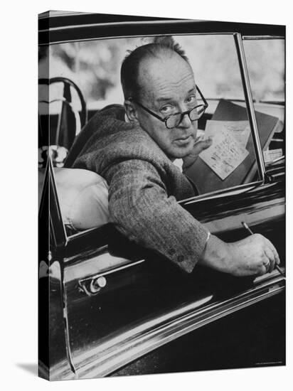 Author Vladimir Nabokov Writing in His Car. He Likes to Work in the Car, Writing on Index Cards-Carl Mydans-Stretched Canvas