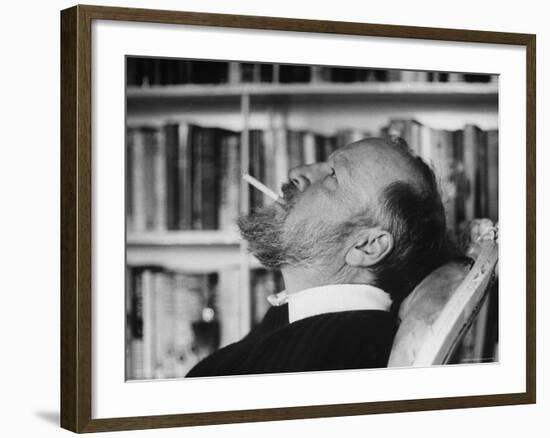 Author William Golding Relaxing in Chair While Cigarette, at Home in Village of Bower Chalk-Paul Schutzer-Framed Premium Photographic Print