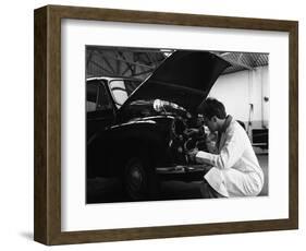 Auto Electrician Changing a Light Bulb on a Morris Minor, Nottingham, Nottinghamshire, 1961-Michael Walters-Framed Photographic Print