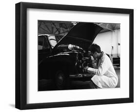 Auto Electrician Changing a Light Bulb on a Morris Minor, Nottingham, Nottinghamshire, 1961-Michael Walters-Framed Photographic Print