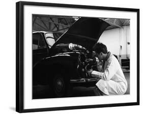 Auto Electrician Changing a Light Bulb on a Morris Minor, Nottingham, Nottinghamshire, 1961-Michael Walters-Framed Photographic Print