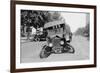 Automobile's Front Axel Breaks Splaying Tires Outward Causing Vehicle to Rest on its Front Bumper.-null-Framed Art Print