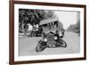 Automobile's Front Axel Breaks Splaying Tires Outward Causing Vehicle to Rest on its Front Bumper.-null-Framed Art Print