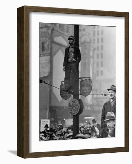 Automotive Union Member Watches from Private Perch During Mass Strike Demonstration-William Vandivert-Framed Photographic Print