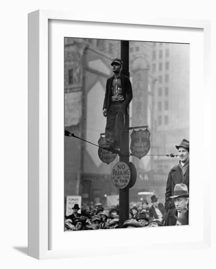 Automotive Union Member Watches from Private Perch During Mass Strike Demonstration-William Vandivert-Framed Photographic Print