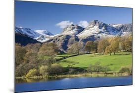 Autumn Colours Beside Loughrigg Tarn with Views to the Snow Dusted Mountains of the Langdale Pikes-Adam Burton-Mounted Photographic Print