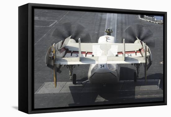 Aviation Boatswain's Mate Directs a C-2A Greyhound onto the Catapult-null-Framed Stretched Canvas