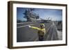 Aviation Boatswain's Mate Directs an F-A-18E Super Hornet-null-Framed Photographic Print