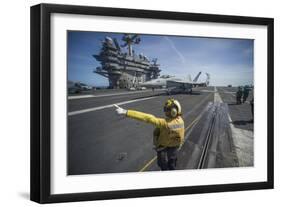 Aviation Boatswain's Mate Directs an F-A-18E Super Hornet-null-Framed Photographic Print