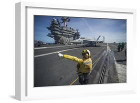 Aviation Boatswain's Mate Directs an F-A-18E Super Hornet-null-Framed Photographic Print