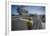 Aviation Boatswain's Mate Directs an F-A-18E Super Hornet-null-Framed Photographic Print