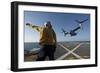 Aviation Boatswain's Mate Directs an MV-22 Osprey as it Launches from the Flight Deck-null-Framed Premium Photographic Print