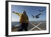 Aviation Boatswain's Mate Directs an MV-22 Osprey as it Launches from the Flight Deck-null-Framed Photographic Print