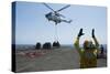 Aviation Boatswain's Mate Directs an SA-330J Puma Helicopter-null-Stretched Canvas