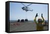 Aviation Boatswain's Mate Directs an SA-330J Puma Helicopter-null-Framed Stretched Canvas