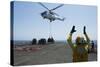 Aviation Boatswain's Mate Directs an SA-330J Puma Helicopter-null-Stretched Canvas