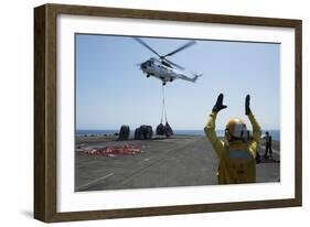 Aviation Boatswain's Mate Directs an SA-330J Puma Helicopter-null-Framed Photographic Print