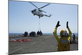 Aviation Boatswain's Mate Directs an SA-330J Puma Helicopter-null-Mounted Photographic Print