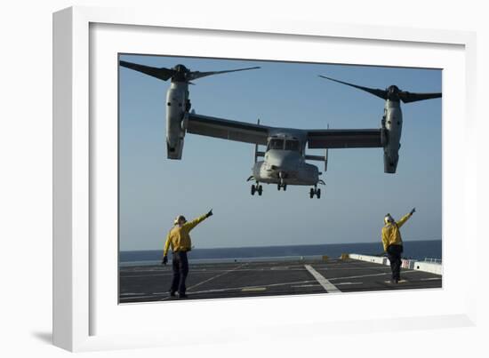 Aviation Boatswain's Mates Direct an MV-22 Osprey as it Launches from the Flight Deck-null-Framed Photographic Print