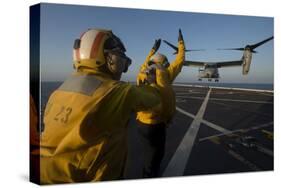 Aviation Boatswain's Mates Direct an MV-22 Osprey on the Flight Deck-null-Stretched Canvas