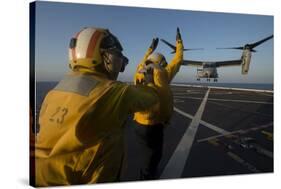 Aviation Boatswain's Mates Direct an MV-22 Osprey on the Flight Deck-null-Stretched Canvas