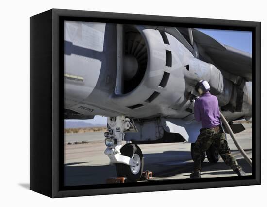 Aviation Fuel Technician Attaches a Fuel Line to an Av-8B Harrier-null-Framed Stretched Canvas