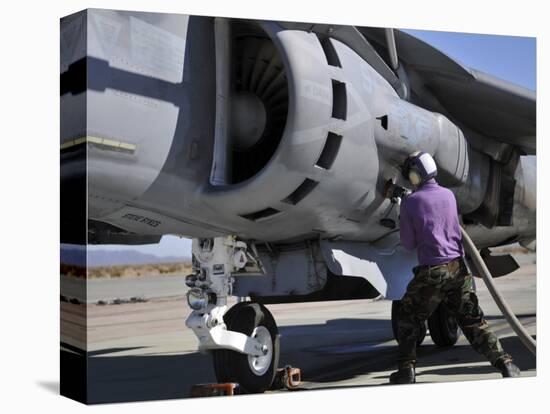 Aviation Fuel Technician Attaches a Fuel Line to an Av-8B Harrier-null-Stretched Canvas