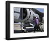 Aviation Fuel Technician Attaches a Fuel Line to an Av-8B Harrier-null-Framed Photographic Print