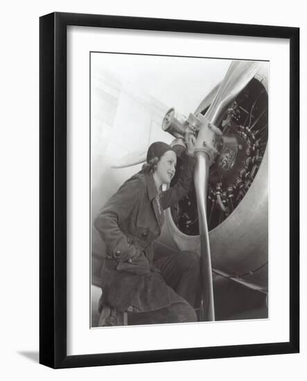 Aviatrix with Prop Engine-null-Framed Art Print