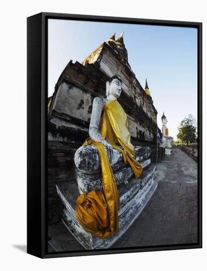 Ayutthaya Wat Yai Chai Mongkol Row of Buddha Statues-Terry Eggers-Framed Stretched Canvas