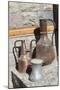 Azerbaijan, Lahic. A copper kettle and jug sitting outside a residence.-Alida Latham-Mounted Photographic Print