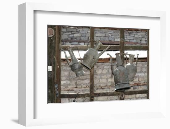 Azerbaijan, Lahic. Antique kettles hanging on the inside of a window.-Alida Latham-Framed Photographic Print