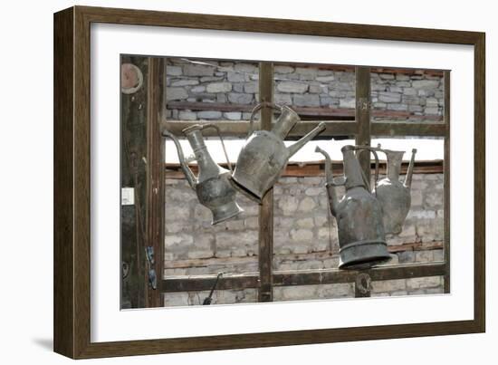 Azerbaijan, Lahic. Antique kettles hanging on the inside of a window.-Alida Latham-Framed Photographic Print