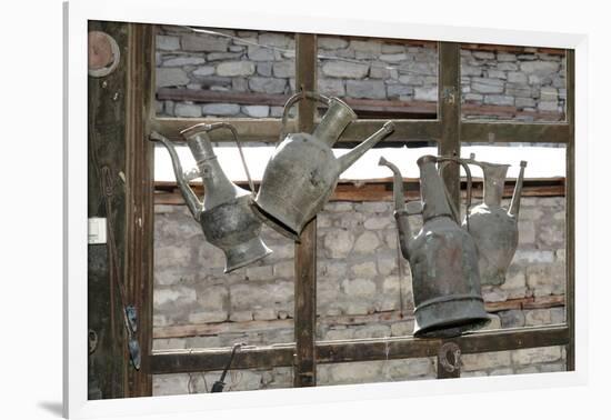 Azerbaijan, Lahic. Antique kettles hanging on the inside of a window.-Alida Latham-Framed Photographic Print