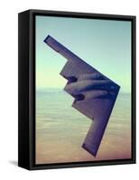 B-2 Stealth Bomber Flying over Desert-Like Landscape-null-Framed Stretched Canvas