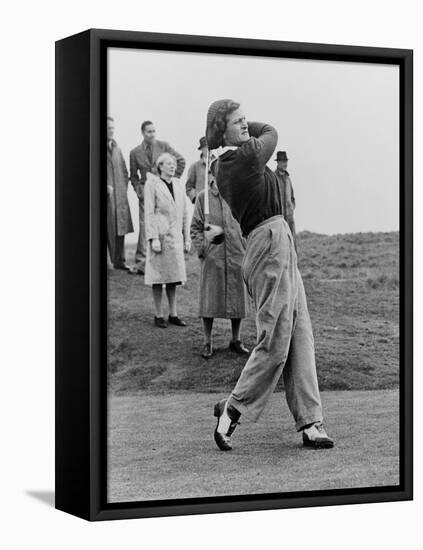 Babe Didrikson, Watching Golf Ball as She Completes Her Swing-null-Framed Stretched Canvas